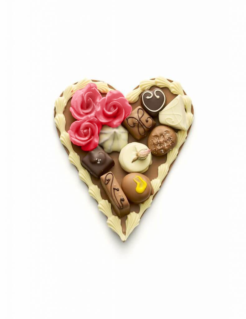Chocolate heart with bonbons